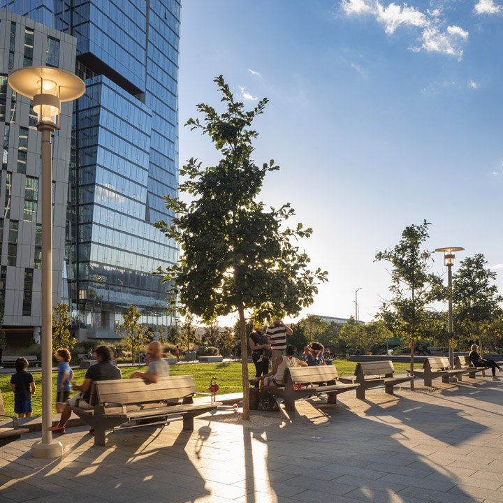 families in the waterline square park greenspace